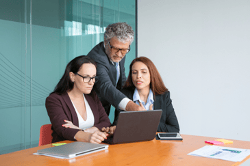 group-top-managers-watching-discussing-project-presentation-laptop-male-executive-pointing-display-while-female-managers-explaining-details-365-1